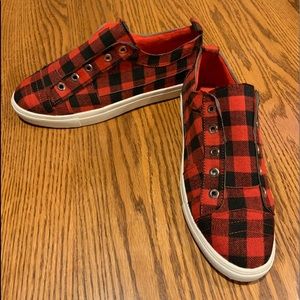 Woman’s Red And Black Checkered Slip On Sneaker